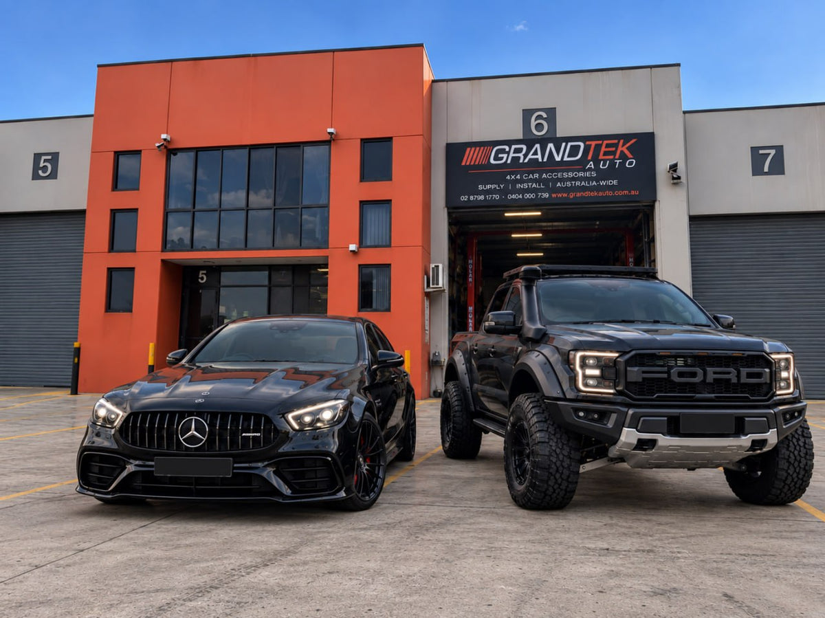 Mercedes and Ford vehicles outside the Grandtek Auto workshop